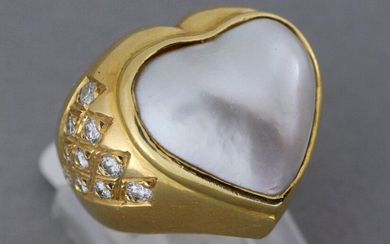 Gold ring decorated with a heart-shaped pearl and pavements of...