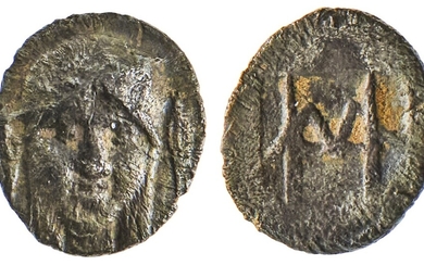 Ionia. Kolophon. AR Tetartemorion, 500-450 BC. 0.3 gms. Head of Apollo facing slightly right, r...