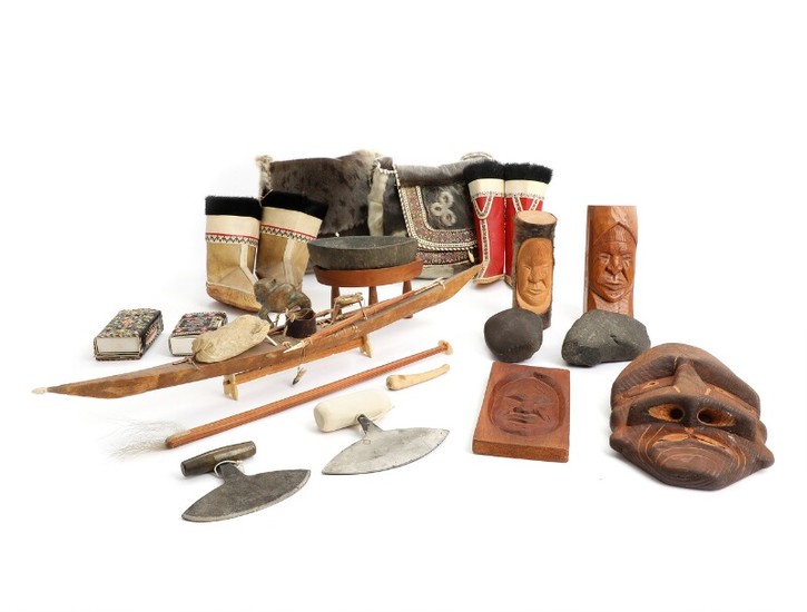 Jocum Sikemsen, a.o.: Various Greenlandic pieces comprising a model kayak, figures, snow shoes a.o. 20th century. L. 10–152 cm. (20)