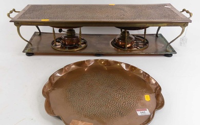 Lot details An early 20th century copper warming plate, the...
