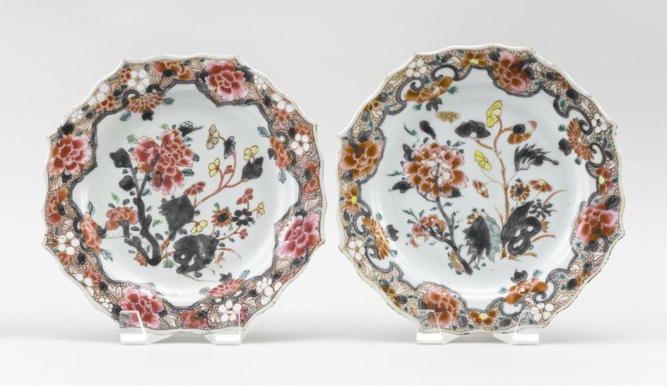 PAIR OF CHINESE EXPORT FAMILLE ROSE PORCELAIN BARBED-EDGE PLATES With peony and prunus decoration against a rose ground. Diameters 9".