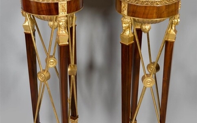 PAIR OF CONTINENTAL NEOCLASSICAL PARCEL-GILT MAHOGANY PEDESTALS, EARLY 19TH CENTURY