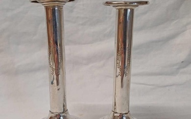 PAIR STERLING SILVER CANDLESTICKS ON CIRCULAR BASES BY BIRKS...