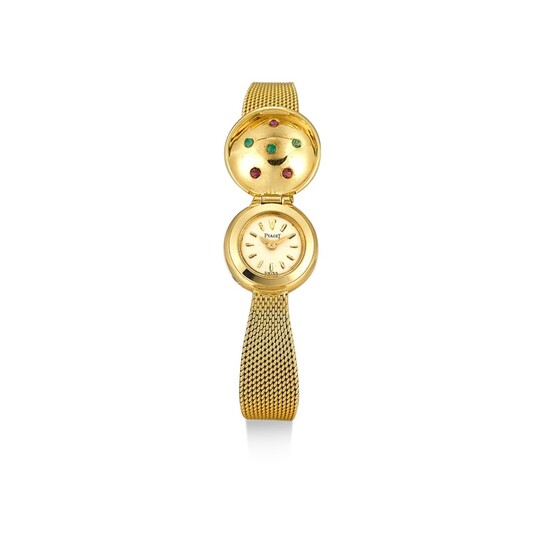 PIAGET | REFERENCE 3325 A YELLOW GOLD AND SAPPHIRE-SET BRACELET WATCH WITH CONCEALED DIAL, CIRCA 1970