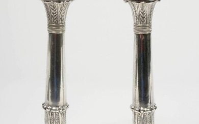 Pair of 833/1000th silver Empire style torches with Belgian hallmarks. Hallmark of the goldsmith Delheid. (Blows). H.:+/-30cm. Total weight:+/-860grs.