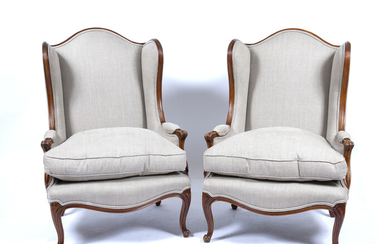 Pair of French style wing armchairs