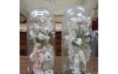 Pair of antique French glass marriage domes, each with porce...