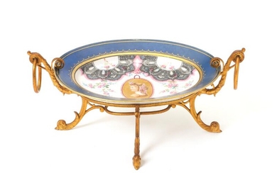 SOLD. Porcelain dish decorated in colours, lying on gilt metal stand. 19th century. H. 14...