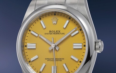Rolex, Ref. 124300 A sought-after and attractive stainless steel wristwatch with center seconds, yellow dial, bracelet, guarantee and presentation box