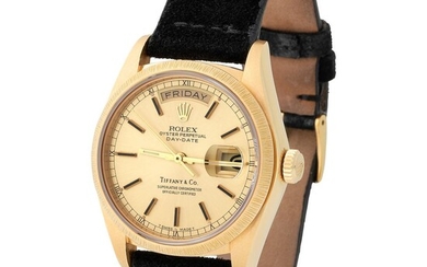 Rolex. Special and Refined Day-Date Automatic Wristwatch in Yellow Gold, Reference 18 078, With Champagne Dial Retailed by Tiffany & Co, Service and Booklet