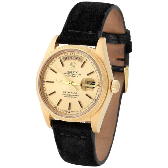 Rolex. Special and Refined Day-Date Automatic Wristwatch in Yellow Gold, Reference 18 078, With Champagne Dial Retailed by Tiffany & Co, Service and Booklet