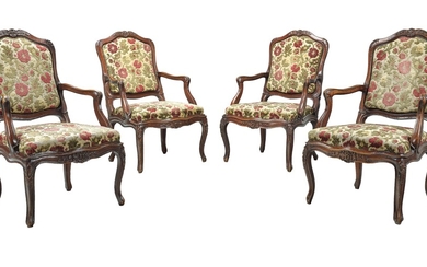A Set of Four Armchairs