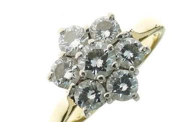 Seven stone diamond 18ct gold cluster ring, the modern...