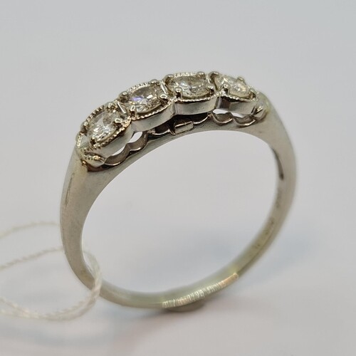 Star Lot : White 14ct Gold 4 stone diamond ring. Fabulous ar...