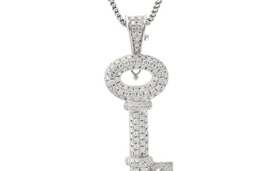 THEO FENNELL, A DIAMOND KEY PENDANT NECKLACE in 18ct white gold, the pendant designed as a key pave