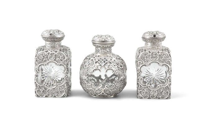 THREE VICTORIAN SILVER OVERLAID AND GLASS PERFUME FLASKS,...