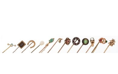 Twelve antique and later gold and yellow metal stickpins inc...