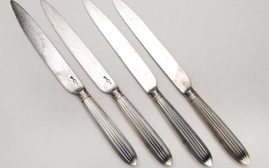 Twelve knives with silver handle