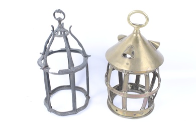 Two antique brass lantern frames.