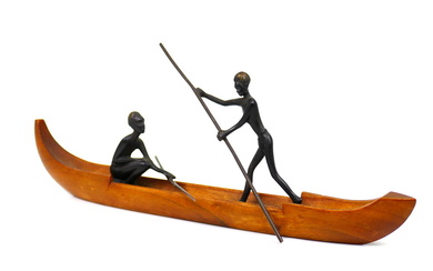 Two bronze sculptures in a wooden boat, design & execution...