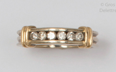 Two-colour gold ring set with a line of...