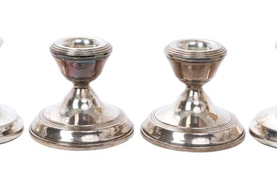 Two pairs of contemporary silver dwarf candlesticks