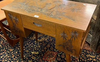 Vintage oak ladies desk/work table, the top carved with figu...
