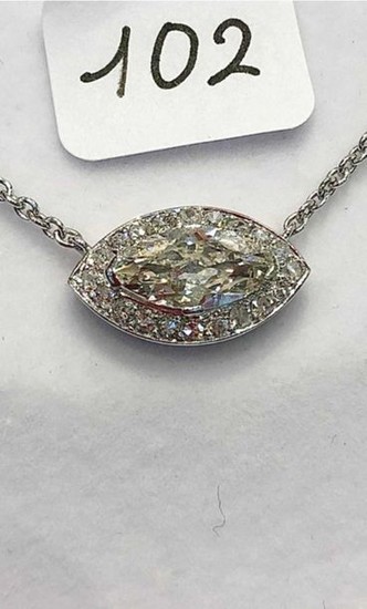 White gold chain, supporting a white gold pendant,...