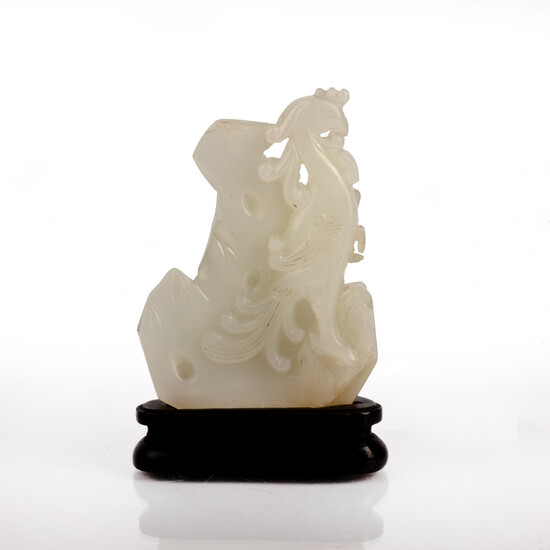 White jade carving Chinese, 18th Century depicting a phoenix set...
