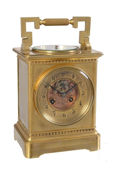 A French brass giant carriage clock with aneroid barometer