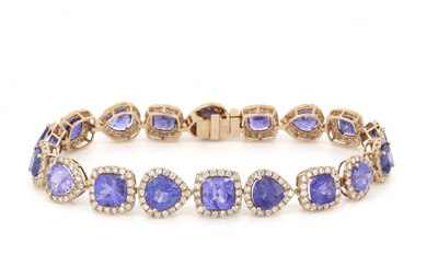 14K Rose Gold, Tanzanite and Diamond, Halo Bracelet. The design...