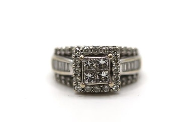 14K White Gold Ring with Baguette cut, 4 princess cut and 42 round cut diamonds. Size