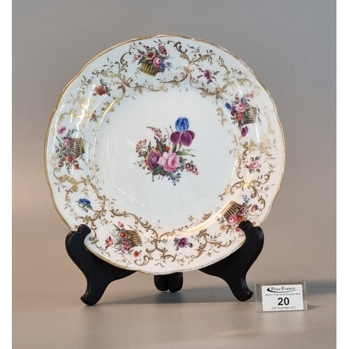 19th Century porcelain Nantgarw plate on a white ground with...