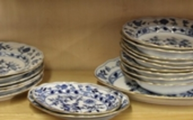 An 18 piece 19th Century Meissen porcelain dinner service, largest dish W. 39cm.