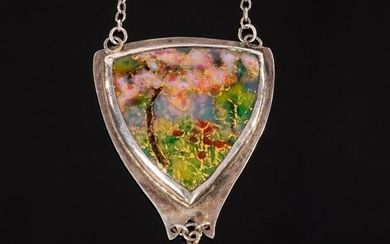 An Art Nouveau enamel pendant, the triangular plaque