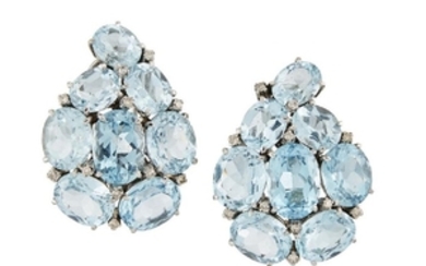 A pair of blue topaz and diamond...