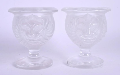A PAIR OF FRENCH LALIQUE LION HEAD GLASS VASES. 9 cm