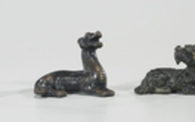 Group of Four Chinese Bronze Scroll Weights
