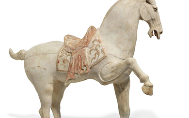 A LARGE PAINTED POTTERY FIGURE OF A PRANCING HORSE, TANG DYNASTY (AD 618-907)