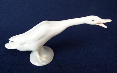 Lladro figure of an aggressive goose. 6 inches long. Perfect conditon.