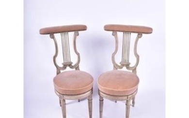 A pair of Louis XVI French lyre back chairs