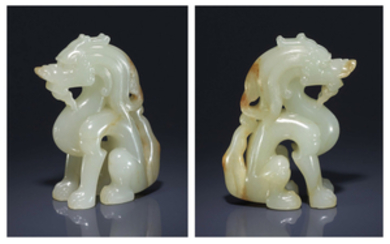 A RARE AND FINELY CARVED WHITE JADE DRAGON, 17TH CENTURY OR EARLIER