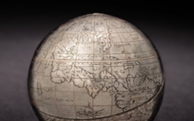 SILVER TERRESTRIAL GLOBE — AFTER OTERSCHADEN, Johann (fl.1600-1603). Probably Flemish or southern German, c.1600. The 60mm diameter globe comprised of two silver hemispheres joined along the ecliptic, with pinholes at the poles.