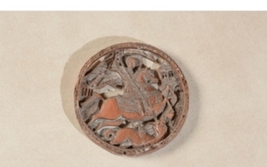 A Slavic carved boxwood pendant representing Saint George and the Dragon