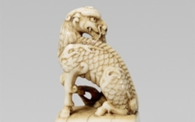 An elegant ivory seal netsuke of a kirin. 19th century