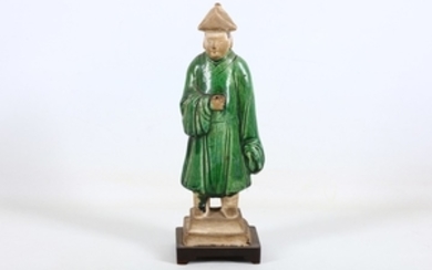 A Chinese figure with green glazed clothing, Ming...
