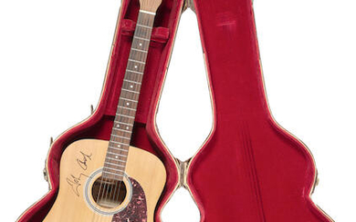 Johnny Cash's Personally Owned and Used Acoustic Guitar Signed By Johnny Cash, with case