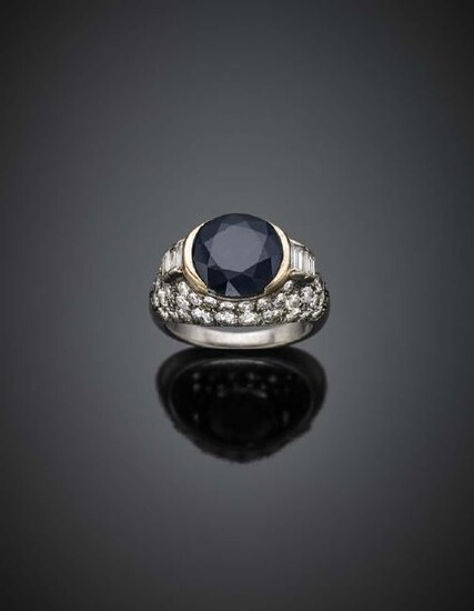 Round ct. 6.20 circa sapphire with round and baguette