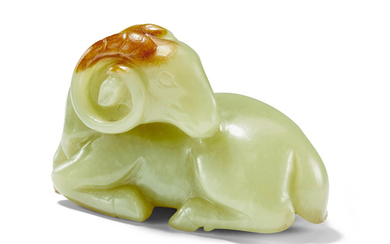 A YELLOW AND RUSSET JADE RAM CARVING