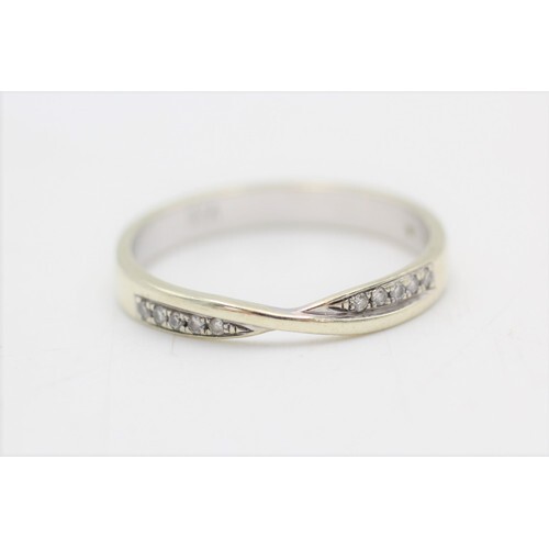 9ct gold white gold diamond channel setting crossover ring (...